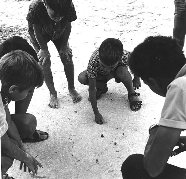 Children playing with marbles (jūlōt) at Qibbuts ʿEyn ha-Shofeṭ, near Ḥaifa.