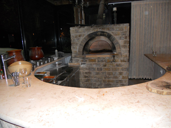 A ṭābūn, or stone oven, in an Israeli restaurant.